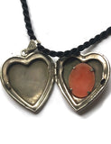 Hand Carved Shell Cameo Set into a Sterling Silver Heart Shaped Locket From DiVinci Cameos