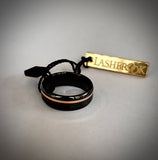 Lashbrook's Black Zirconium Wedding Band with a thin 14k rose gold accent ring.