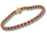 Ruby Bracelet, 38 Emerald Cut Rubies bezel set into 14k Yellow Gold